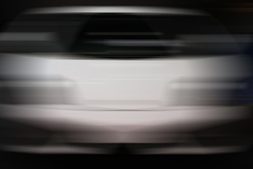 Obraz na płótnie Canvas Abstract blurred white car