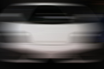 Fototapeta premium Abstract blurred white car