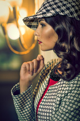 attractive lady with stylish cap © Grischa Georgiew