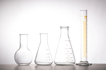 Chemistry flask glassware in laboratory with white background