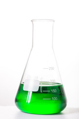 Chemistry test in flask glassware in laboratory with white background
