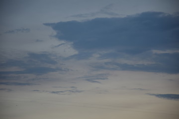 Dark overcast clouds sky background.