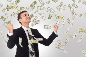 Businessman happy with lots of money