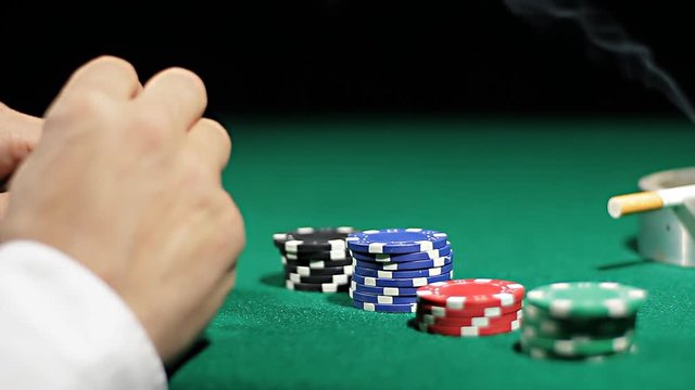 playing poker close up on hand holding four aces