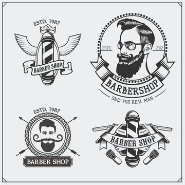 Set of vintage Barber shop labels, badges, emblems and design elements.