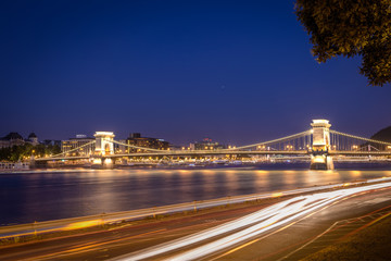 Fototapeta premium Night shot of Szechenyi Chain Bridge is a suspension bridge spans the River Danube of Budapest, the capital of Hungary.