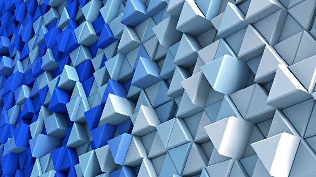 Wall of blue and white extruded triangles. Seamless loop smooth animation with motion blur. Abstract 3D render 4k UHD (3840x2160)
