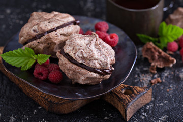 Meringue dessert with chocolate and raspberries
