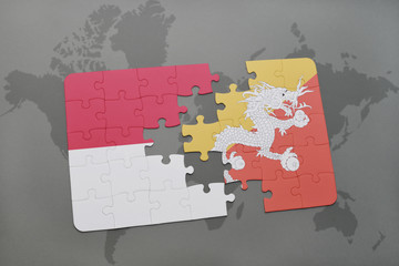 puzzle with the national flag of indonesia and bhutan on a world map background.