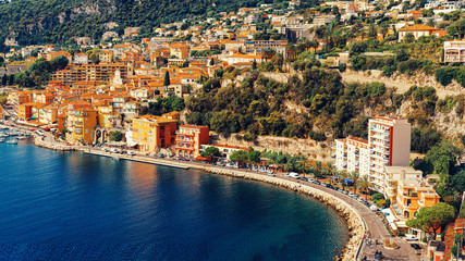 Fototapeta premium view of luxury resort and bay on sunny day. Villefranche-sur-Mer, french reviera, near Nice and Monaco