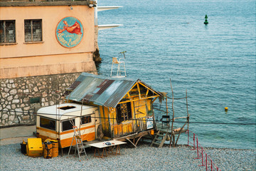 Fototapeta na wymiar beach huts on the shore in nice, France.