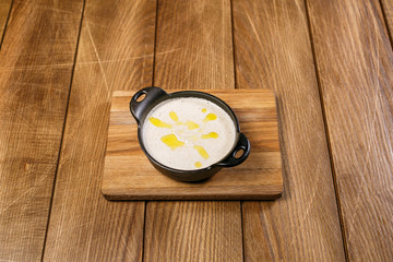 Soup on wooden background