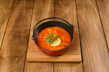 Soup on wooden background