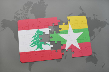 puzzle with the national flag of lebanon and myanmar on a world map background.