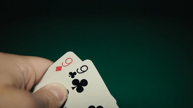 A pair of nines in a hand on the table. Pocker