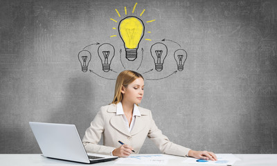 Businesswoman in process of creative work