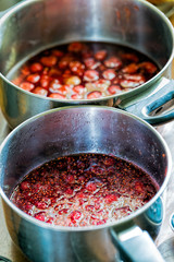 Strawberry and raspberry jam in a saucepan