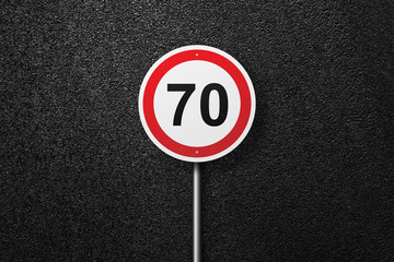 Road sign circular shape on a background of asphalt. The speed limit. The texture of the tarmac, top view.