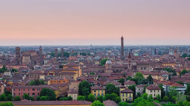 panoramic view of bologna city at the sunset, timelapse from day to night skyline