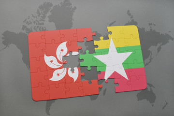 puzzle with the national flag of hong kong and myanmar on a world map background.