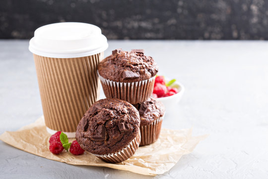 Chocolate muffins with coffee to go