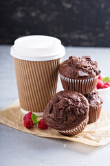 Chocolate muffins with coffee to go