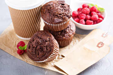 Chocolate muffins with coffee to go