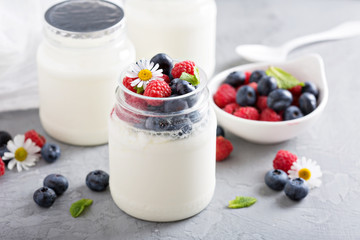 Fresh homemade yogurt in small jars