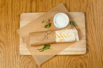 Foto op Plexiglas Beautiful meat dish on a wooden background © fotokretin26