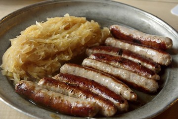 Bratwurst sausages with sauerkraut.