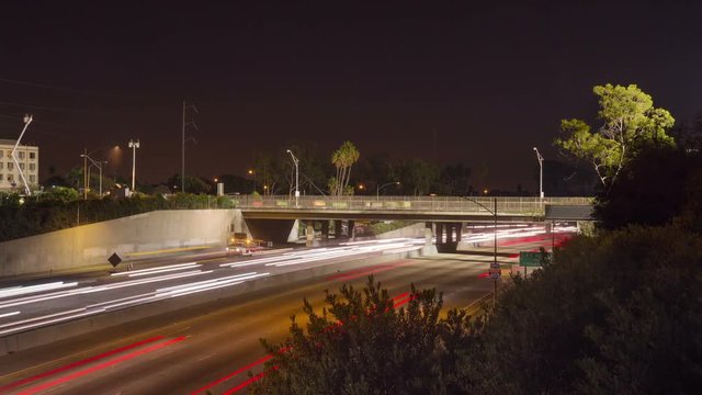 Time Lapse of the Space Shuttle Endeavor crossing over the 405 freeway as travels through the streets of Los Angeles on it's way to it's new home at the LA Science Center.

Note: This is a composite, while the Shuttle was crossing the bridge there was no traffic. The traffic was shot after the Shuttle had crossed.