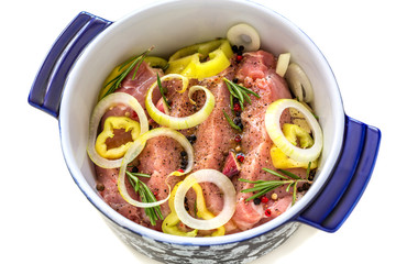 Casserole with marinated meat close-up.
