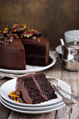 Chocolate cake decorated with donuts