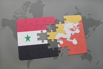 puzzle with the national flag of syria and bhutan on a world map background.