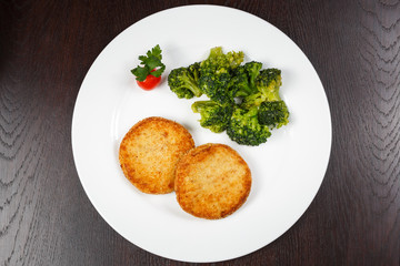 Baking and patties on a wooden background