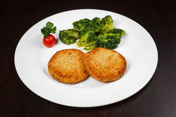 Baking and patties on a wooden background