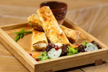 Baking and patties on a wooden background