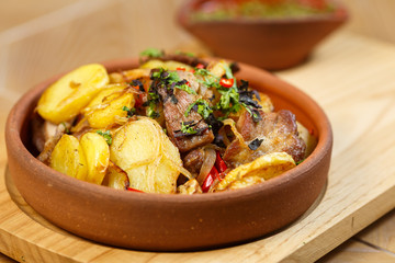 Beautiful meat dish on a wooden background