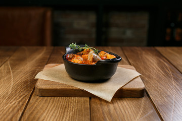 Beautiful meat dish on a wooden background