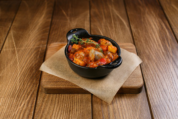 Beautiful meat dish on a wooden background