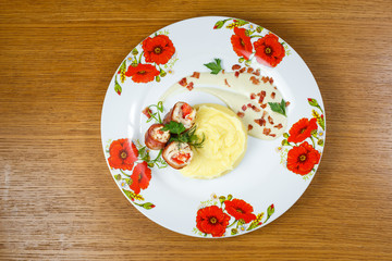 Beautiful meat dish on a wooden background