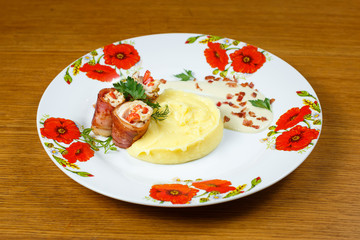Beautiful meat dish on a wooden background