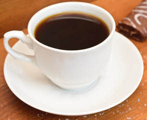 cup of coffee on a wooden table