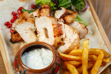 Beautiful meat dish on a wooden background