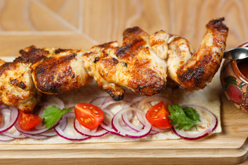 Beautiful meat dish on a wooden background