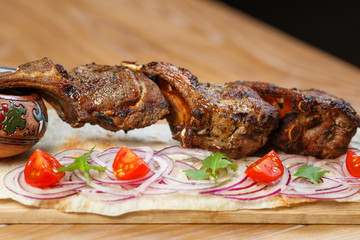 Beautiful meat dish on a wooden background