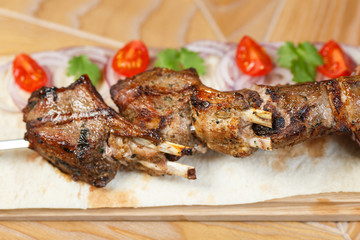 Beautiful meat dish on a wooden background