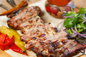 Beautiful meat dish on a wooden background