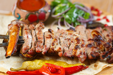 Beautiful meat dish on a wooden background