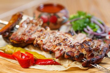 Beautiful meat dish on a wooden background